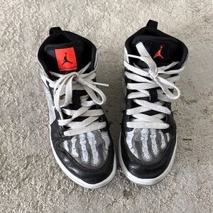 Jordan 1 Mid Kids Black and White Sneakers from Nike